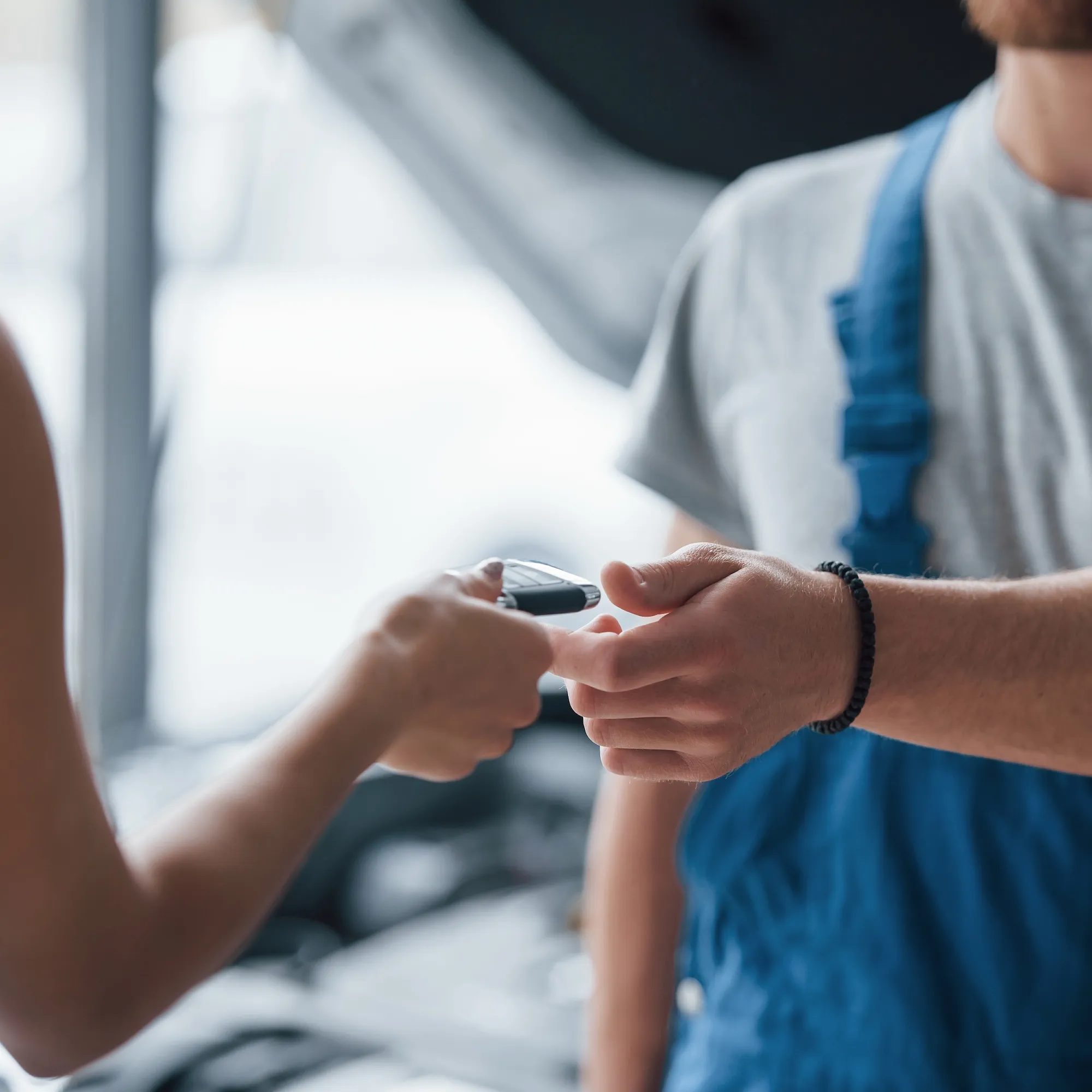 process-giving-keys-woman-auto-salon-with-employee-blue-uniform-taking-her-repaired-car-back